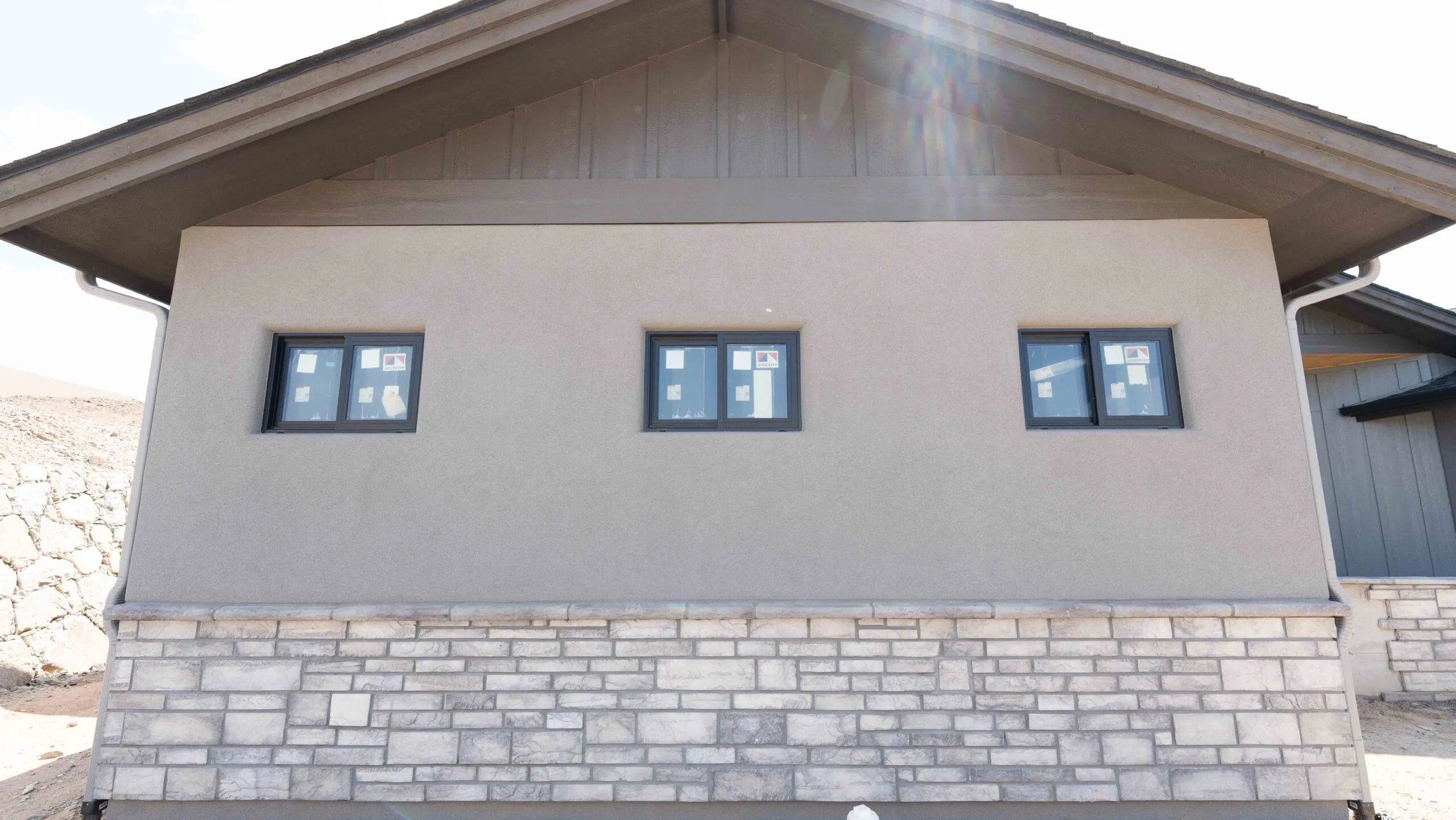 Arizona stucco home with stone accent front view