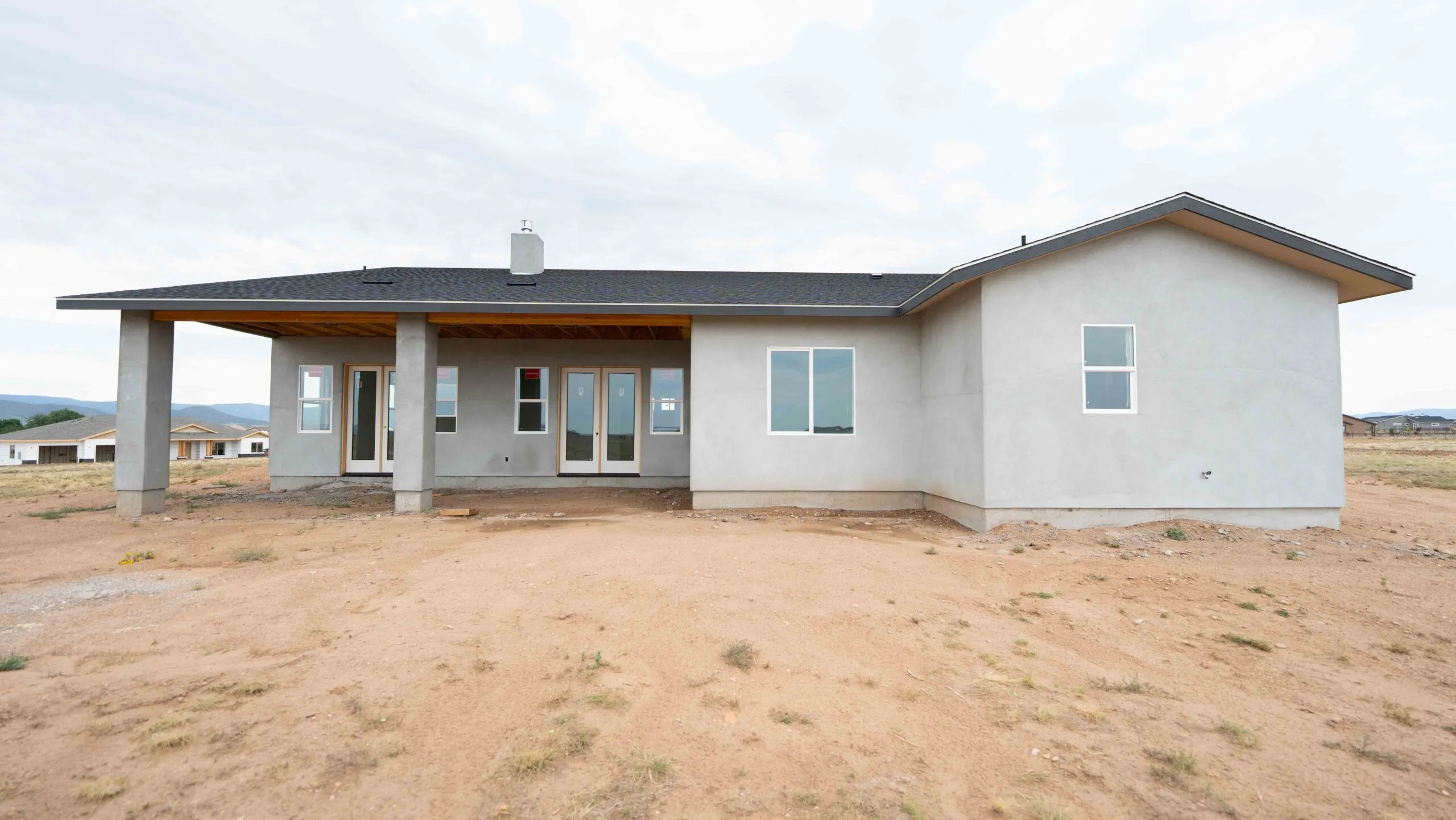Prescott stucco ranch home with covered patio