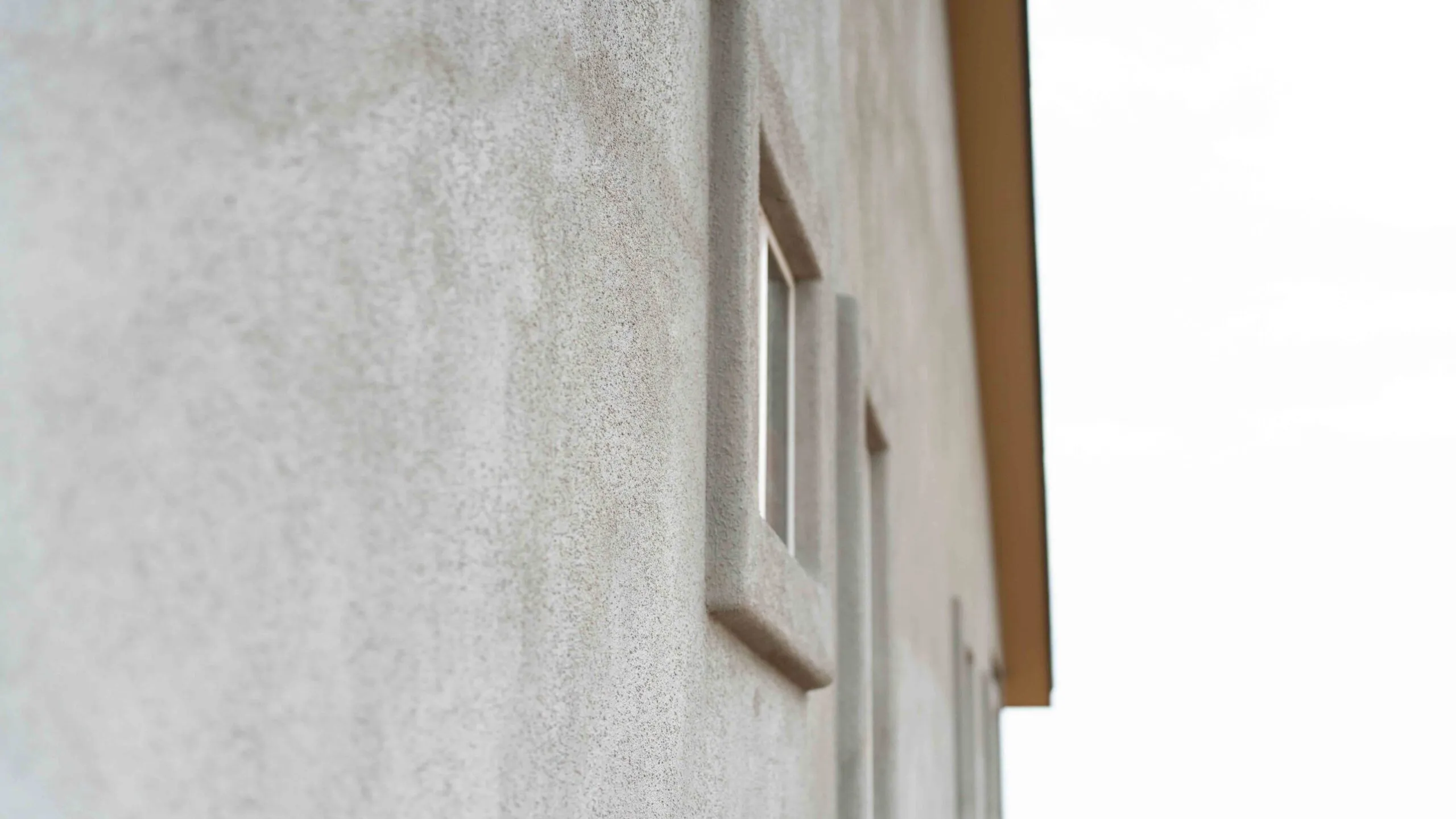 Prescott stucco sand finish texture closeup