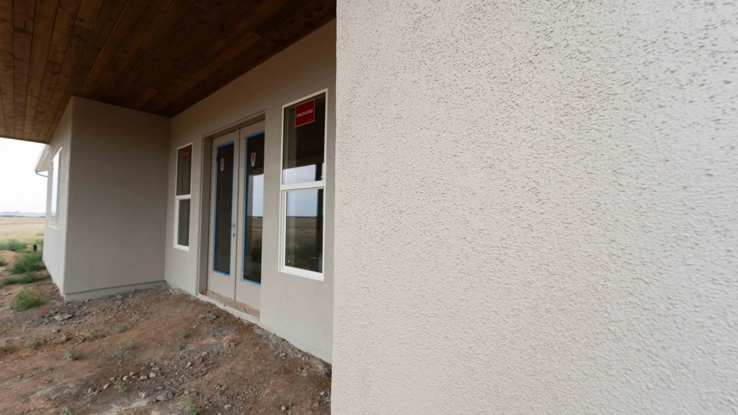 Stucco patio with wood ceiling detail