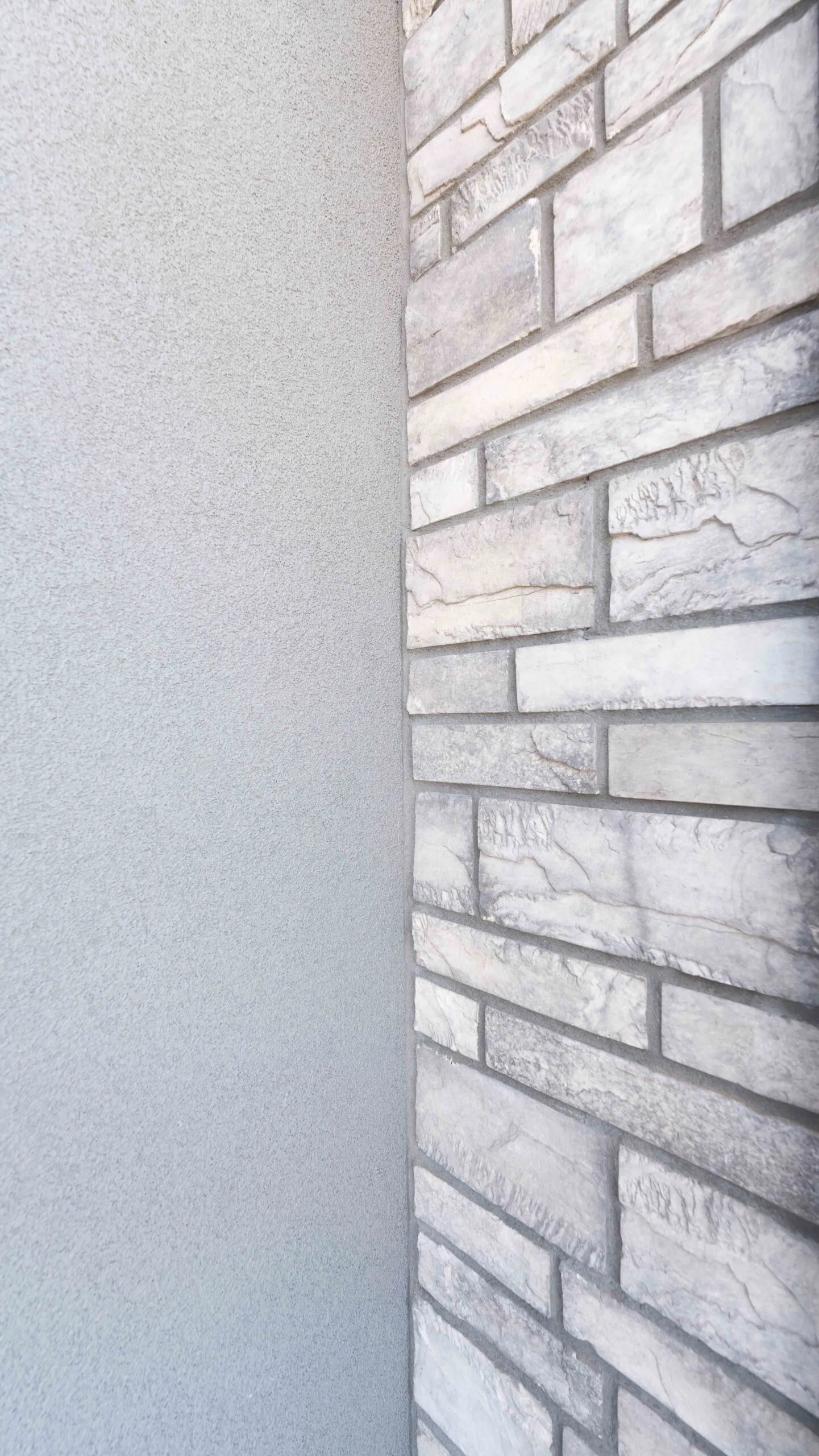Stucco to stone veneer transition detail